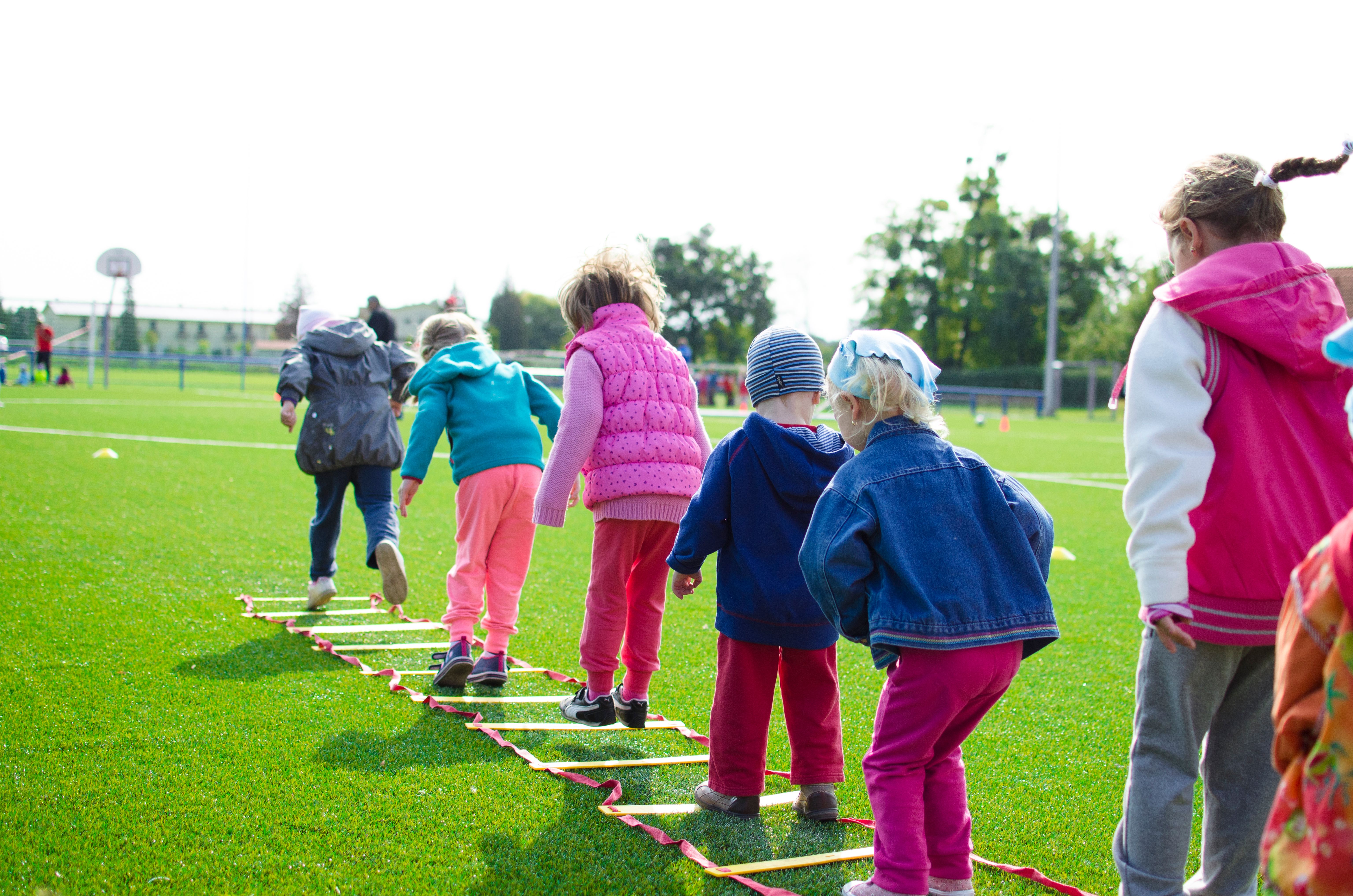 Children playing on field.